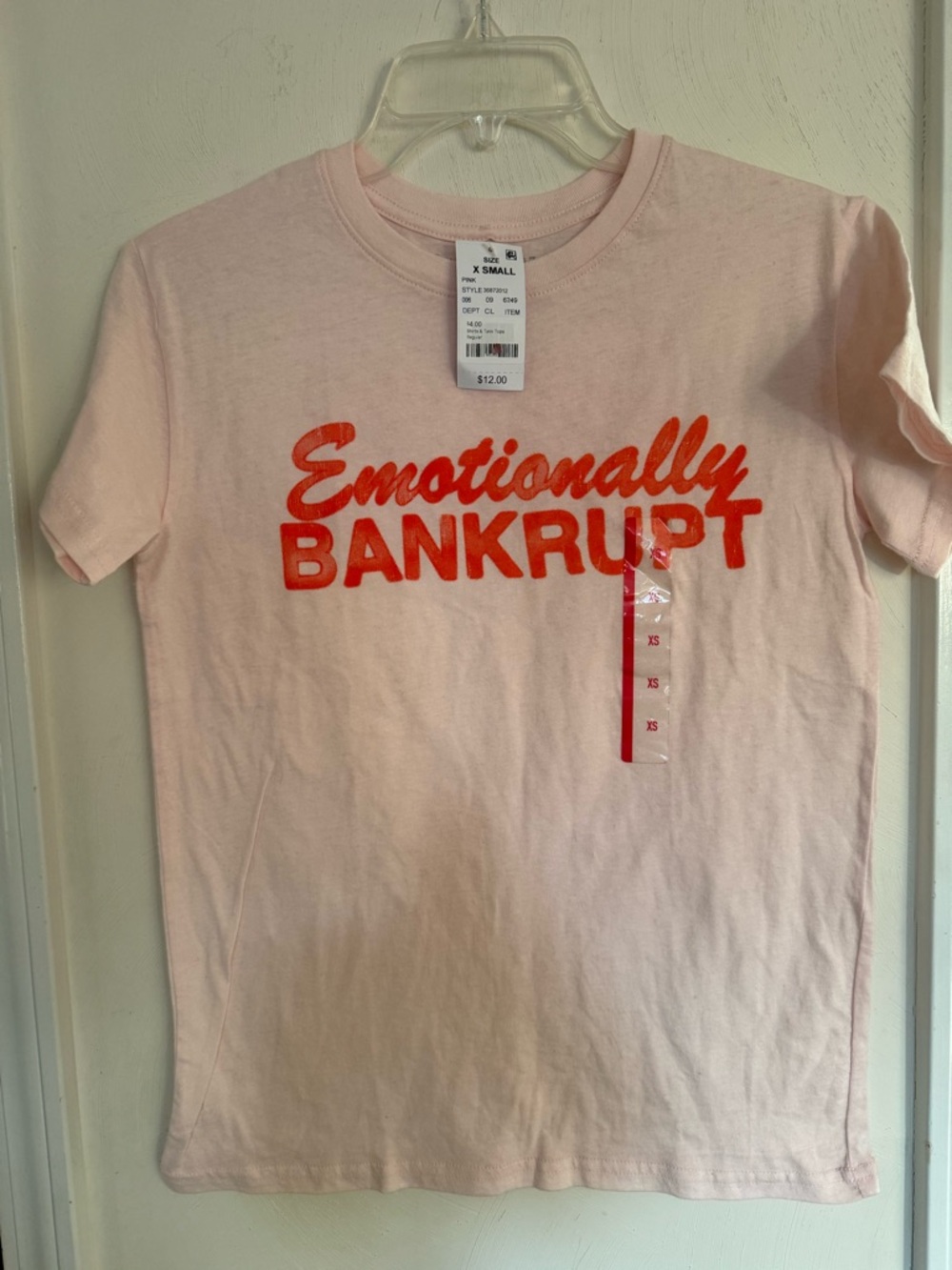 Selena Gomez Light Pink Tee with Red "Emotionally Bankrupt" Graphic